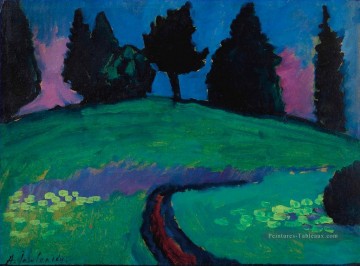 Arbres sombres au dessus d’une pente verte Alexej von Jawlensky Expressionnisme Peinture à l'huile